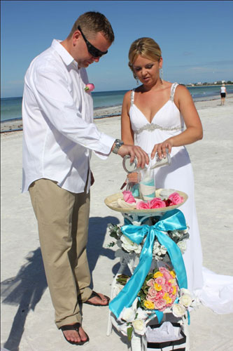 Beach wedding with sand unity ceremony 